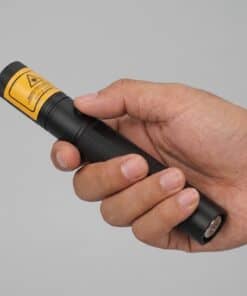 The 200 mW green laser pointer in the hand