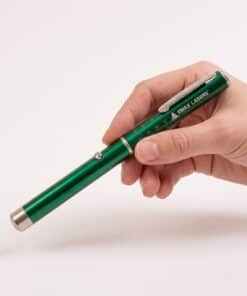 Emax green laser pointer held in the hand, to show the size