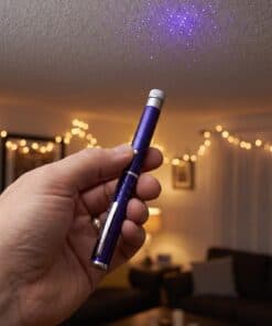 Emax purple laser pointer with five caps: patterns on the ceiling at a party