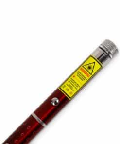 Close-up of the warning label on the red laser pointer with pattern caps, Emax